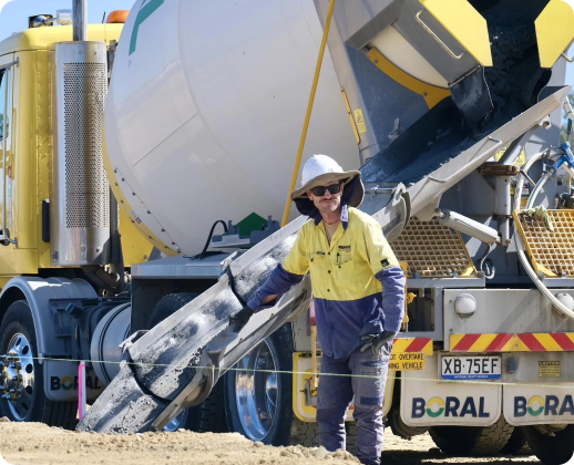 Construction Worker with Concrete Truck